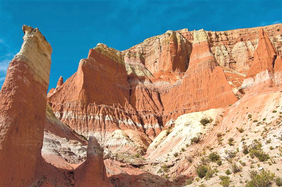 View of the red tinted cliffs at Cusi Cusi Valley of Mars