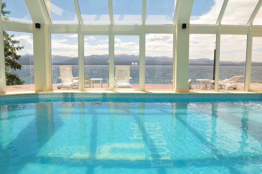 indoor pool and Lake Nahuel Huapi behind it, Hotel Huemul Bariloche Ruta 40 